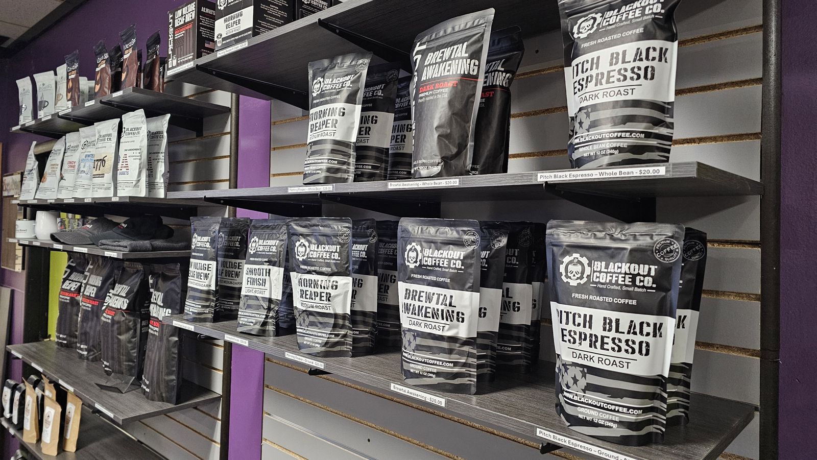 Shelves of Blackout Coffee bags for sale at Back Alley Bowl