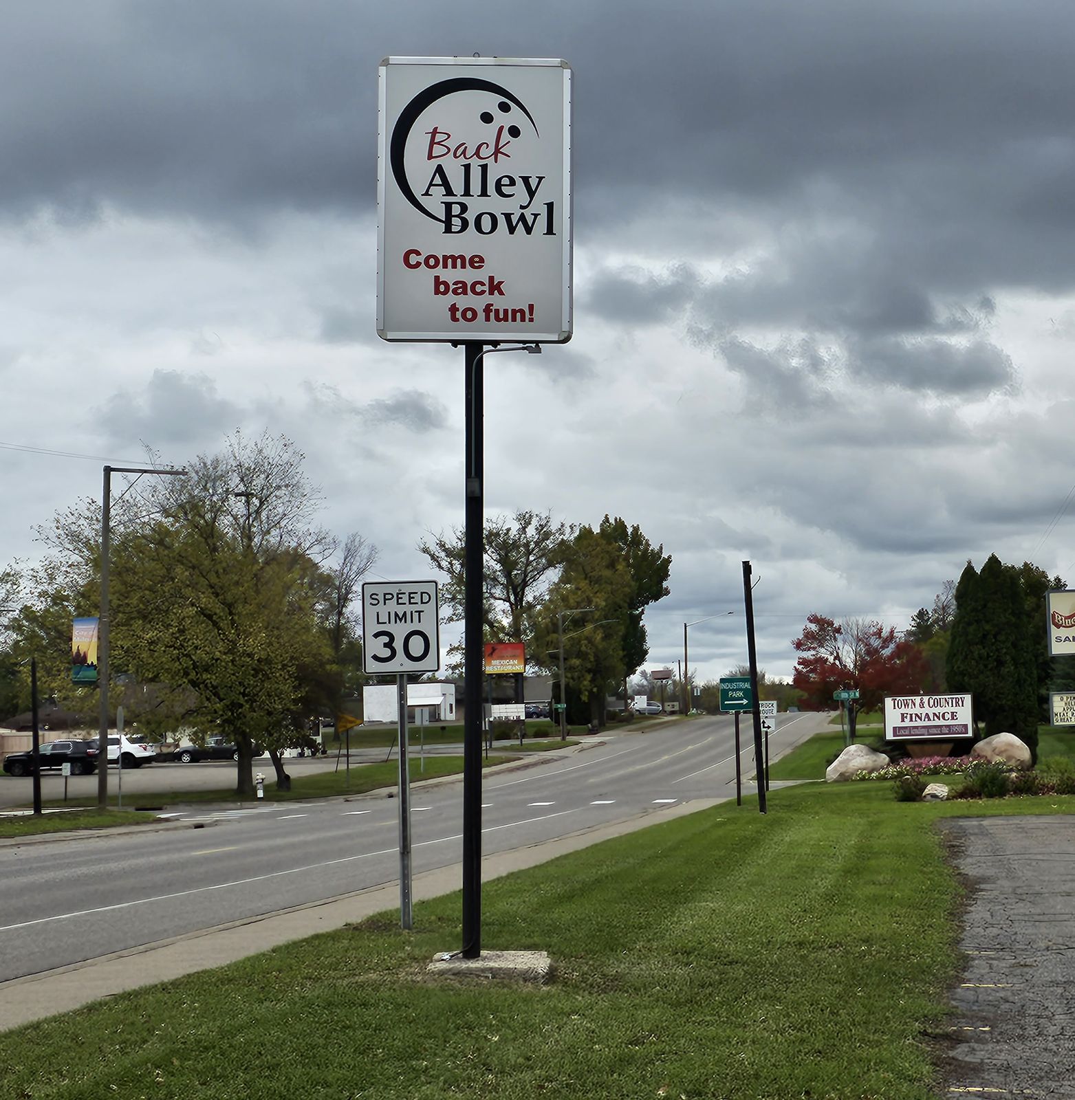 The Back Alley Bowl sign by the road in Milaca